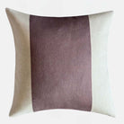 Decorative throw cushion with a wide claret red and off white block design on a white background